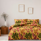 Floral patterned bedding set on a bed in a bedroom with decorative elements.