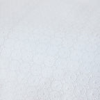 White fabric texture with a subtle pattern