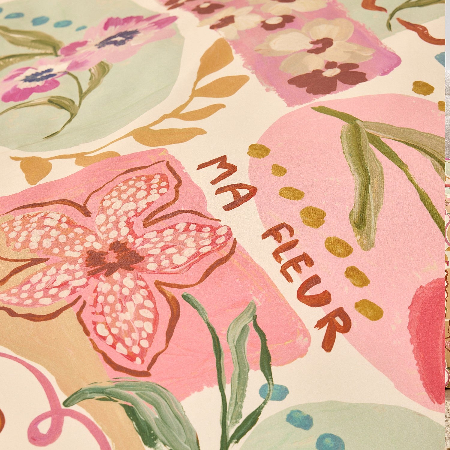 Floral pattern with 'MA FLEUR' text on a colorful background