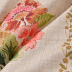 Close-up of floral-patterned fabric with a focus on colors and textures.
