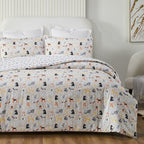 Bedding set with dog pattern on a bed in a room setting