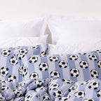 Kids football print duvet cover set close up with white pillowcases in the background