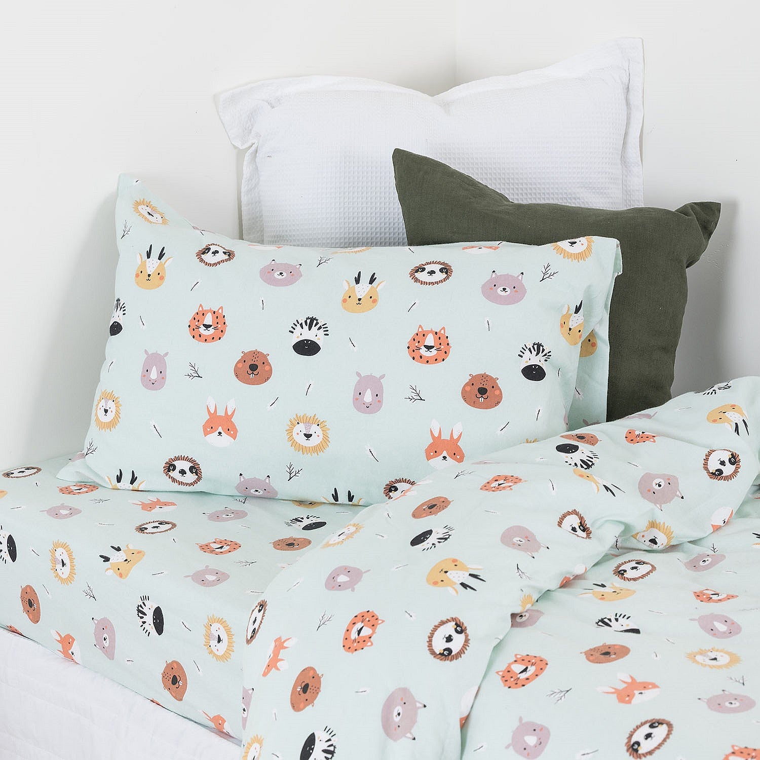 Bedding set with animal pattern on a bed