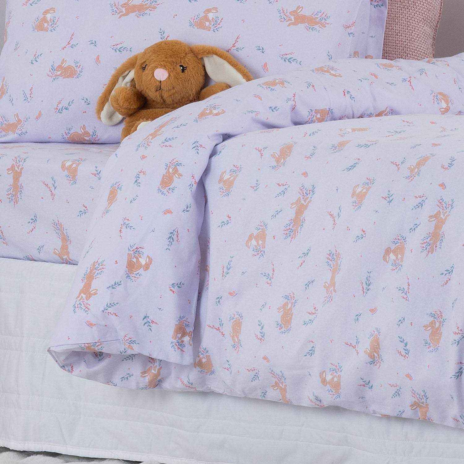 Purple animal print kids duvet cover styled on a bed with matching pillowcase.