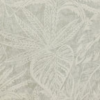 Textured wallpaper with leaf pattern on a light gray background