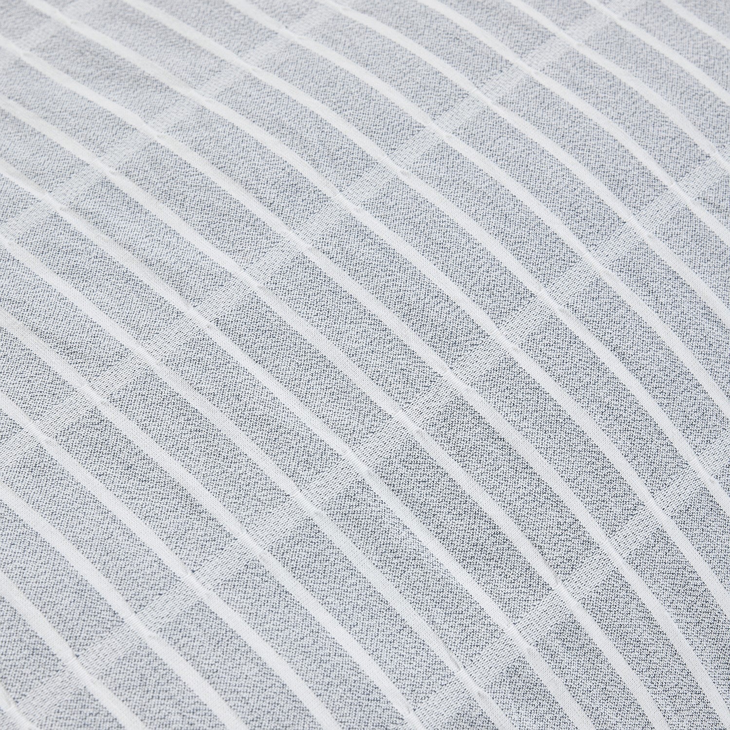Close-up of gray fabric with diagonal stripes