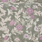 Floral pattern with purple and white flowers on a green background