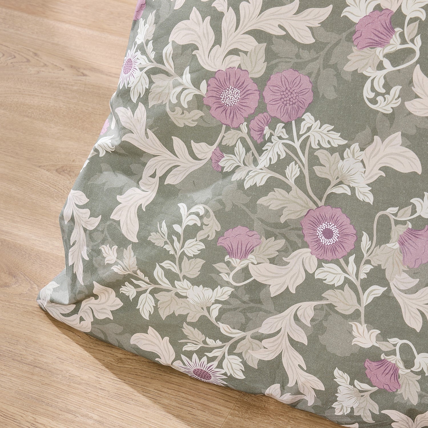 Floral patterned fabric on a wooden surface