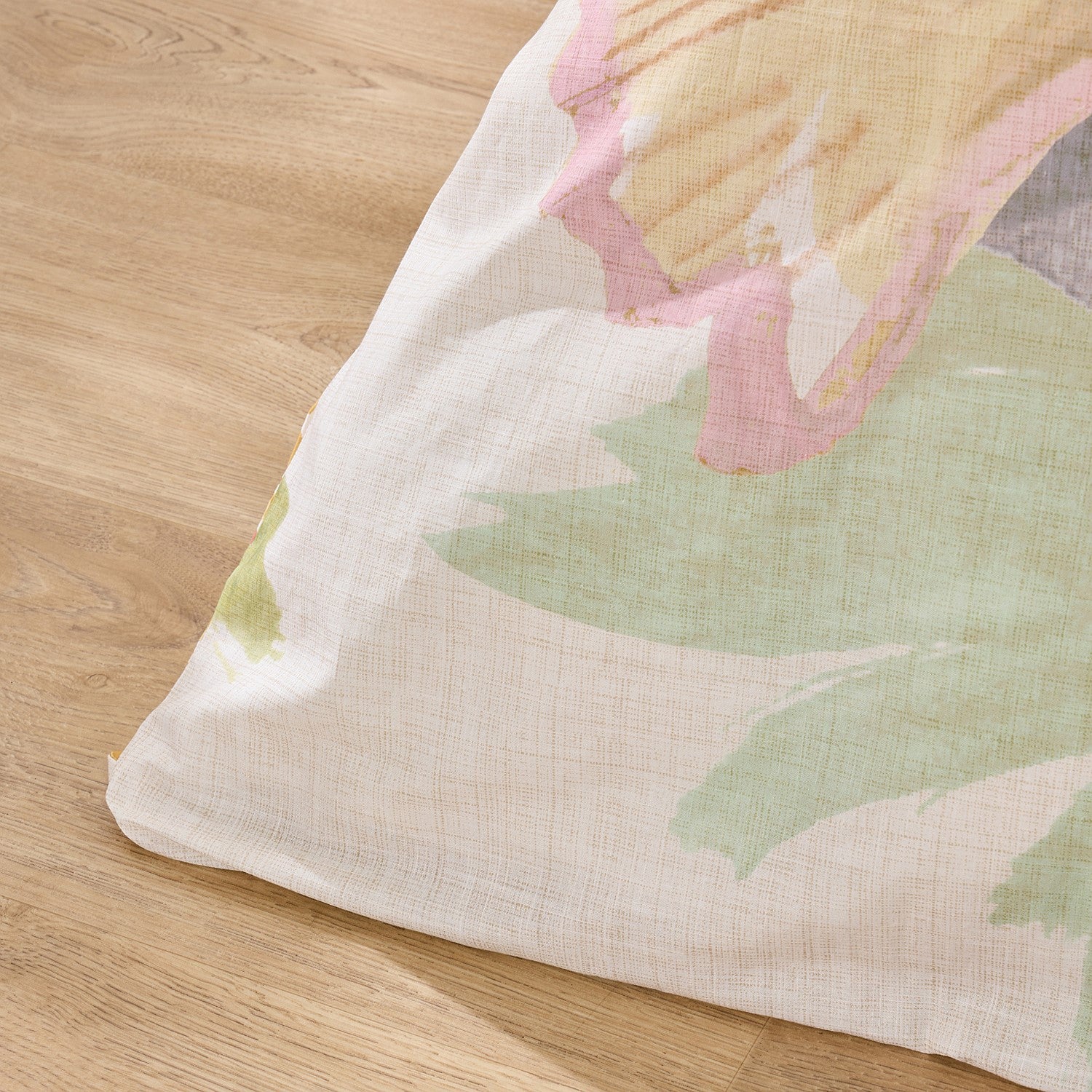 Floral-patterned fabric on a wooden surface