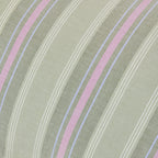 Close-up of fabric with pink and blue stripes on a green background