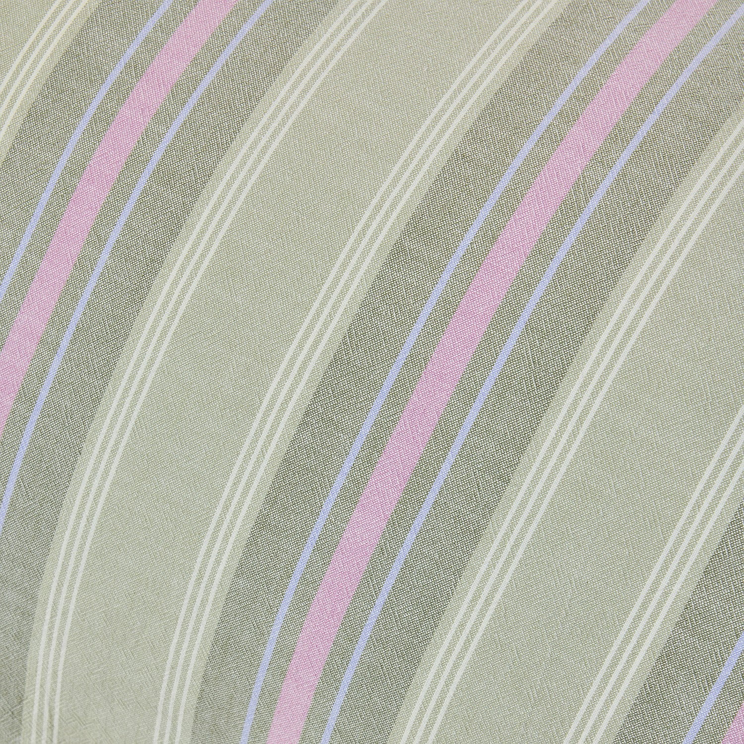 Close-up of fabric with pink and blue stripes on a green background