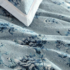 Floral patterned fabric with a white box in the corner