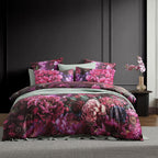 Floral bedding set on a bed with a dark wall and side table in the background