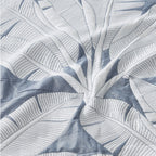 Close-up of a blue and white leaf patterned fabric