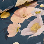 Floral pattern with pink and white flowers on a dark blue background