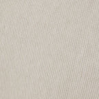 Close-up of a textured beige fabric surface