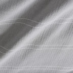Close-up of gray fabric with wavy texture