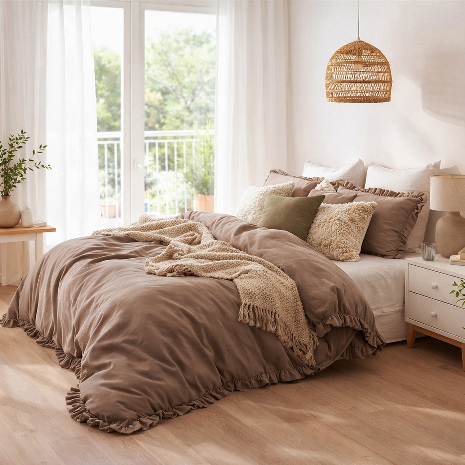 Neatly made bed with brown bedding in a bright bedroom