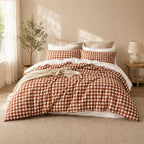 Pecan gingham duvet cover set styled on a bed in a warm neutral bedroom.
