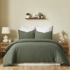 Fieldcrest Chunky Waffle Duvet Cover Set in Khaki, styled on a bed with matching textured pillowcases in a warm neutral bedroom.