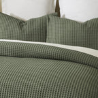 Close-up of the Khaki Fieldcrest Chunky Waffle Duvet Cover Set, showing the raised waffle texture across the duvet cover and pillowcases.