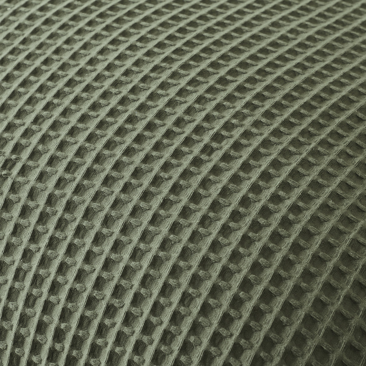 Close-up detail of the Khaki chunky waffle fabric, highlighting the soft textured woven pattern.