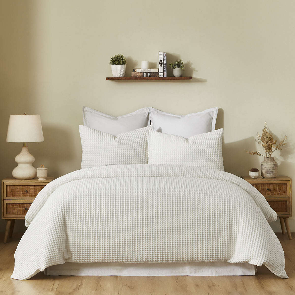 Fieldcrest Chunky Waffle Duvet Cover Set in Off White, styled on a bed with coordinating textured pillowcases in a warm neutral bedroom.