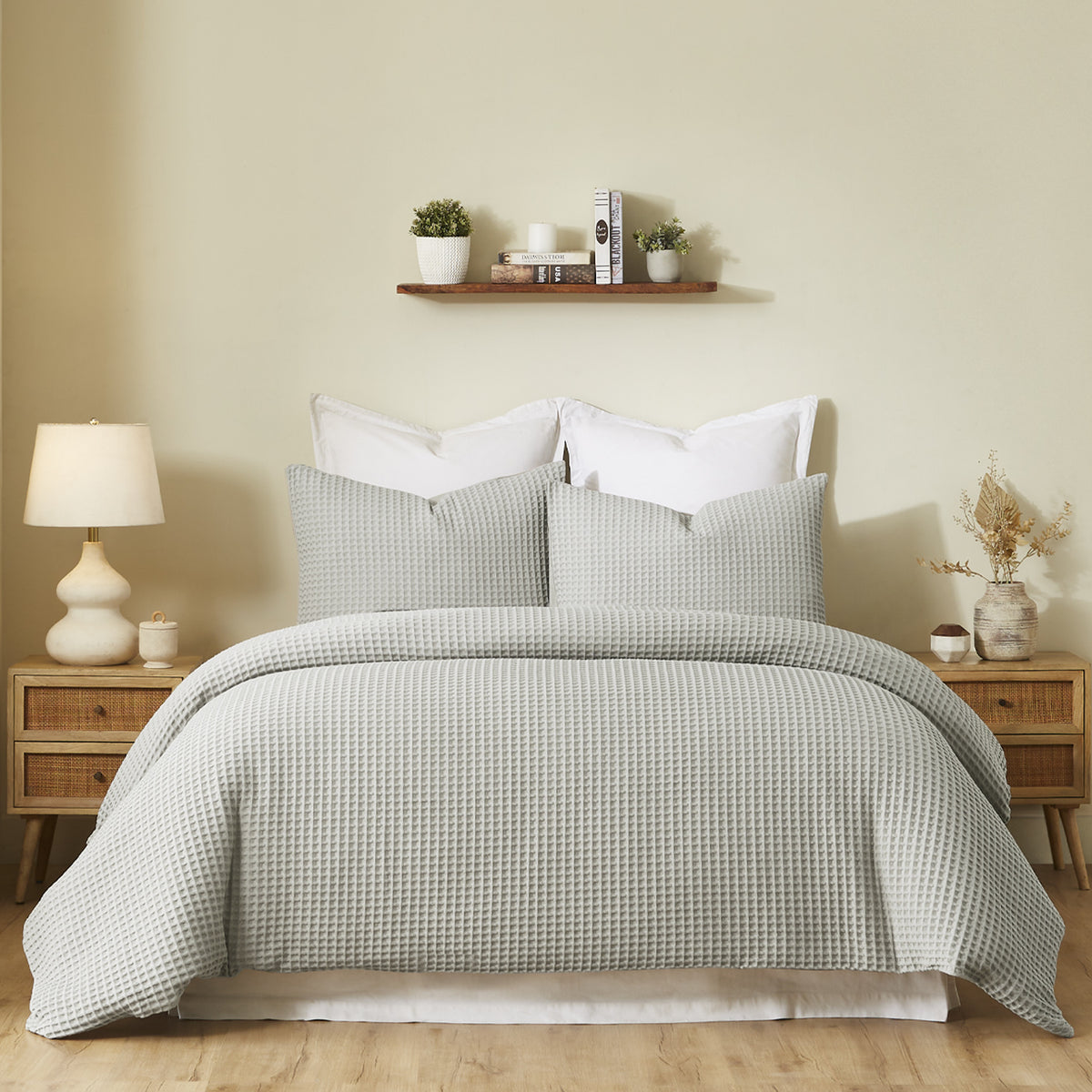 Fieldcrest Chunky Waffle Duvet Cover Set in Stone, styled on a bed with coordinating textured pillowcases in a warm neutral bedroom.