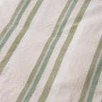 Close-up of the Marlo Neve Cotton Duvet Cover Set, showing the soft green striped pattern and lightly textured cotton fabric.