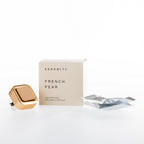 Serenity French Pear car diffuser set on a white background