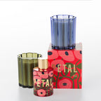 The Aromatherapy Co. Petal home fragrance range with room spray, candle and glass vessels in bold floral packaging.