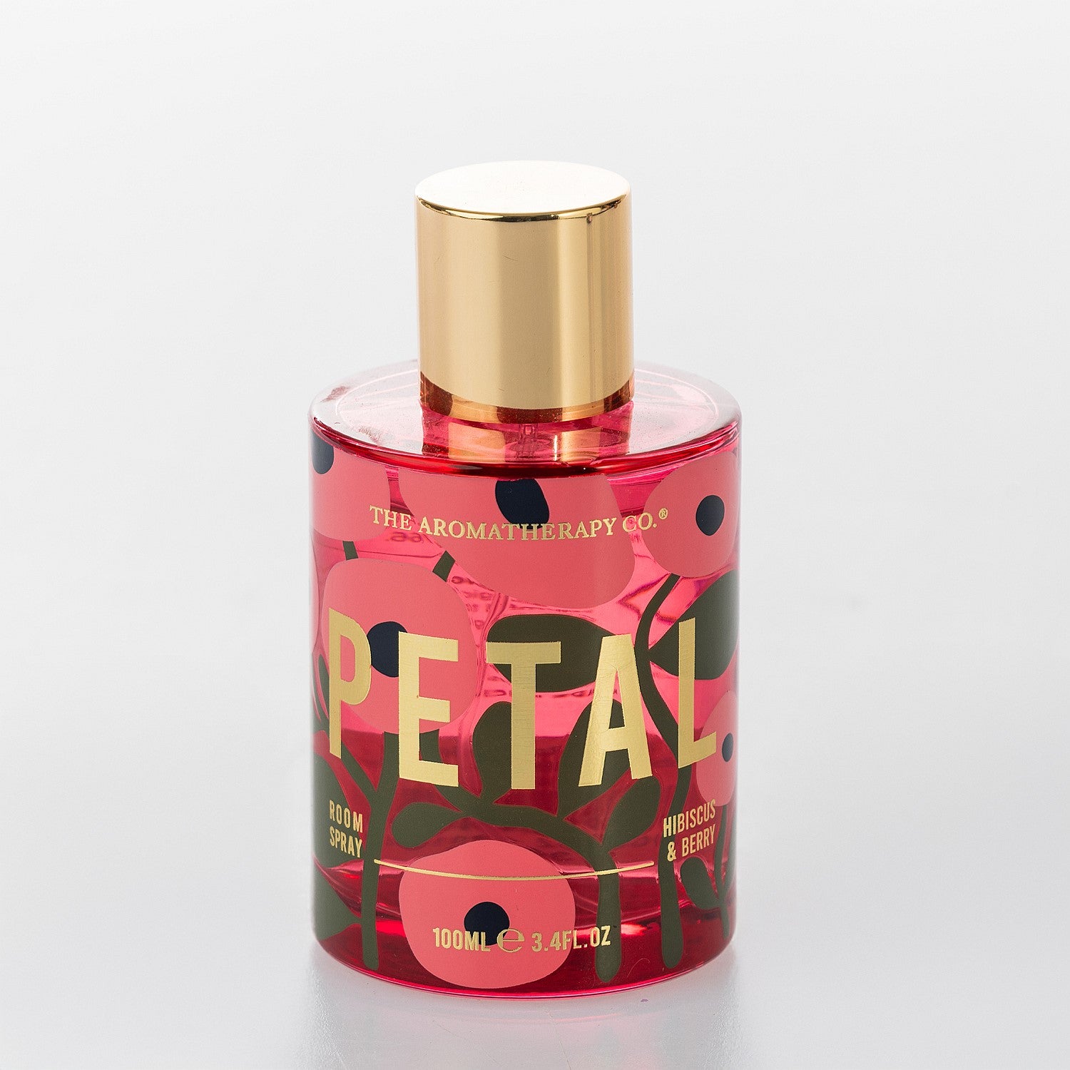 The Aromatherapy Co. Petal Hibiscus & Berry room spray in a pink floral bottle with gold cap.