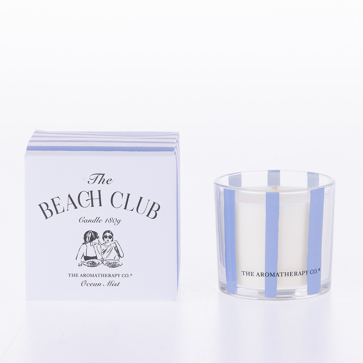 The Aromatherapy Co. The Beach Club ocean mist 180g candle with matching striped box on a white background.