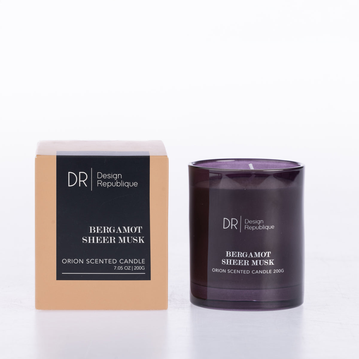Design Republique Orion Scented Candle 200g in Bergamot Sheer Musk, featuring a deep purple glass vessel with coordinating peach and black packaging.