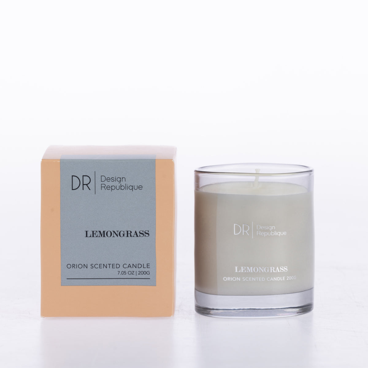 Design Republique Orion Scented Candle 200g in Lemongrass, presented in a clear glass vessel with coordinating peach and grey packaging.
