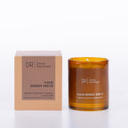 Design Republique Orion Scented Candle 200g in Sage Berry Fruit, featuring an amber glass vessel with coordinating peach-toned packaging.