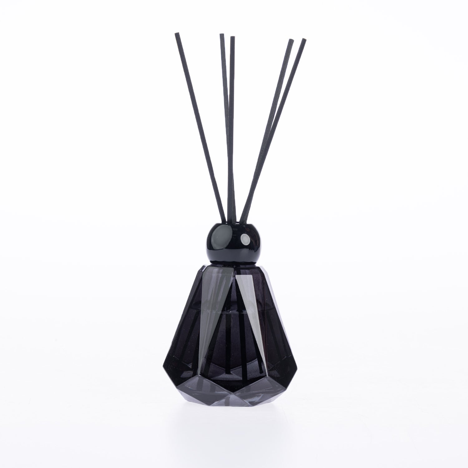 Design Plus Home Continental Charm Ebony Diffuser 180ml in a smoky black faceted glass vessel with black reed sticks and a glossy black cap.