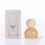 Design Plus Bhodi Reedless Diffuser 70ml in Patchouli, displayed in a decorative glass vessel with a flower-shaped diffuser top.