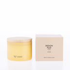 Design Plus Bhodi Candle 350g in Amber, displayed in a decorative glass vessel with a matching lid.