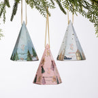 Christmas Wishes Mini Candle in Gift Box 50g Range – Three festive cone-shaped candle gift boxes in Frankincense & Myrrh, Hugs & Kisses and Spiced Plum fragrances, hanging from ribbon loops beneath Christmas greenery.