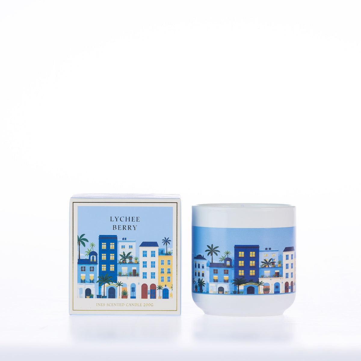 Design Republique Ines Lychee Berry 200g scented candle with blue illustrated buildings on a white vessel and matching packaging.