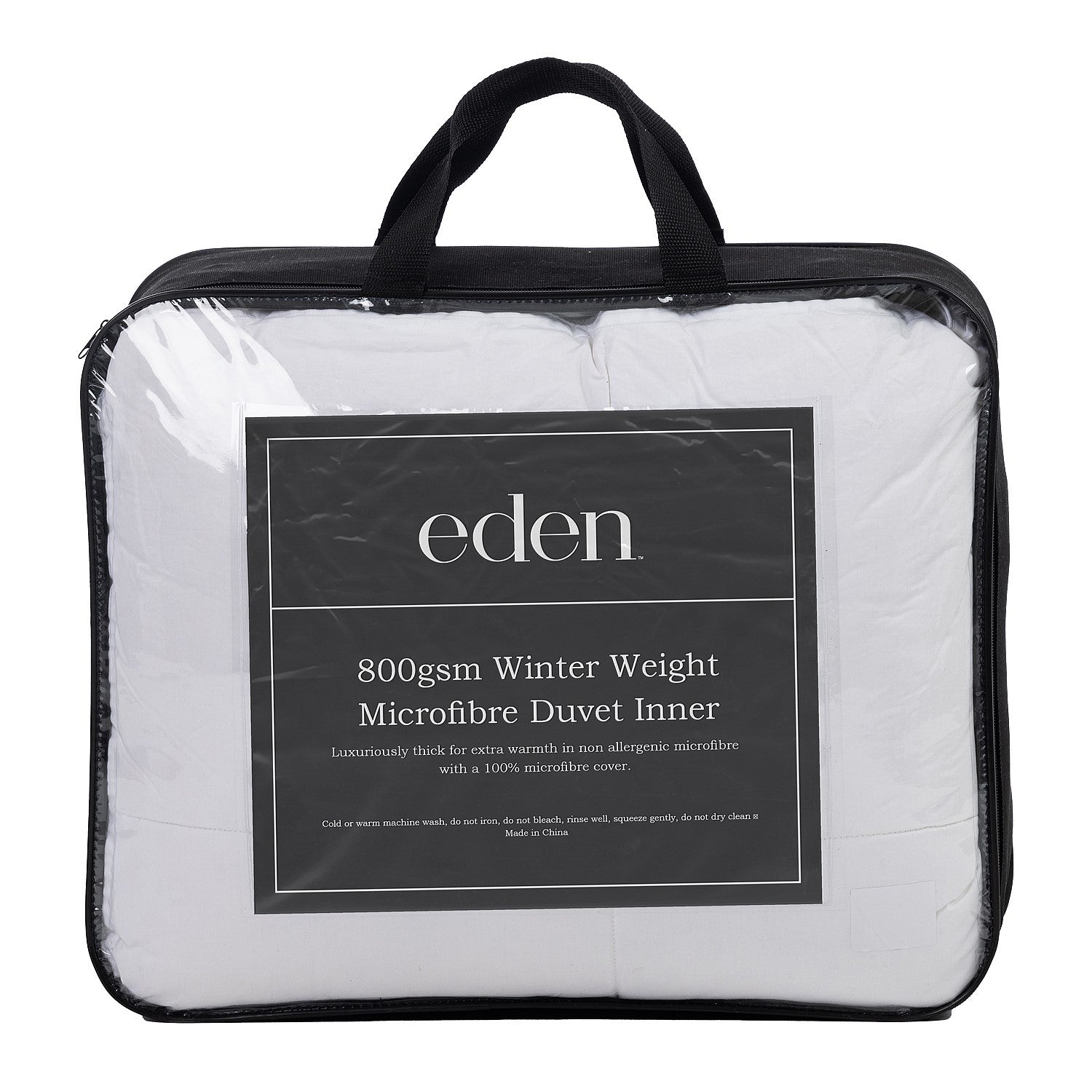 Eden 800gsm Winter Weight Microfibre Duvet Inner in packaging in a clear bag with black handles and sides displayed on a white background.