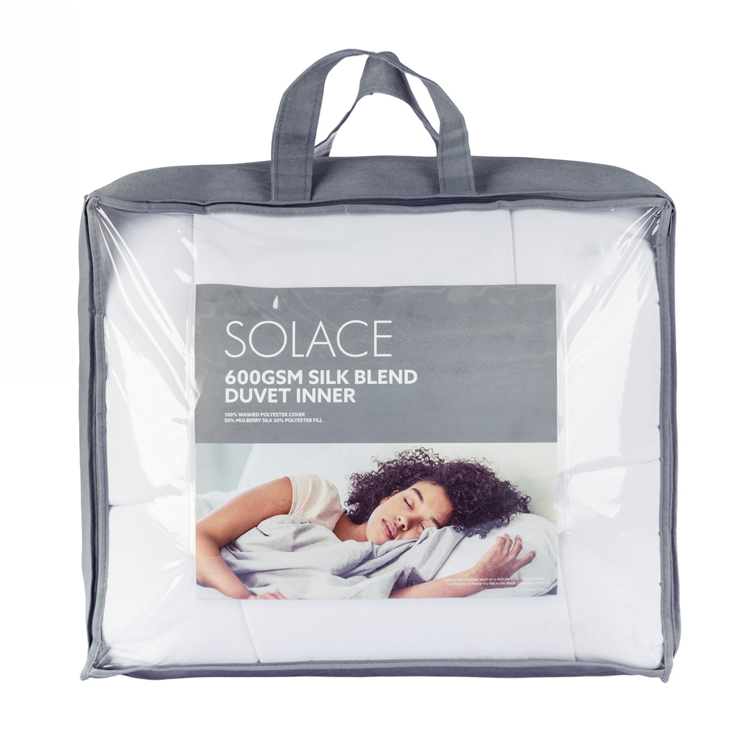Solace Silk Blend 600gsm Duvet Inner in its packaging with grey sides and handles displayed on a white 
