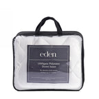 Eden 1000gsm Polyester Duvet Inner in its packaging with black handles and sides displayed on a white background