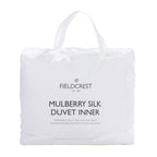 Fieldcrest Mulberry Silk Duvet Inner packaged in a white carry bag with handles, featuring Fieldcrest branding and product details on the front.