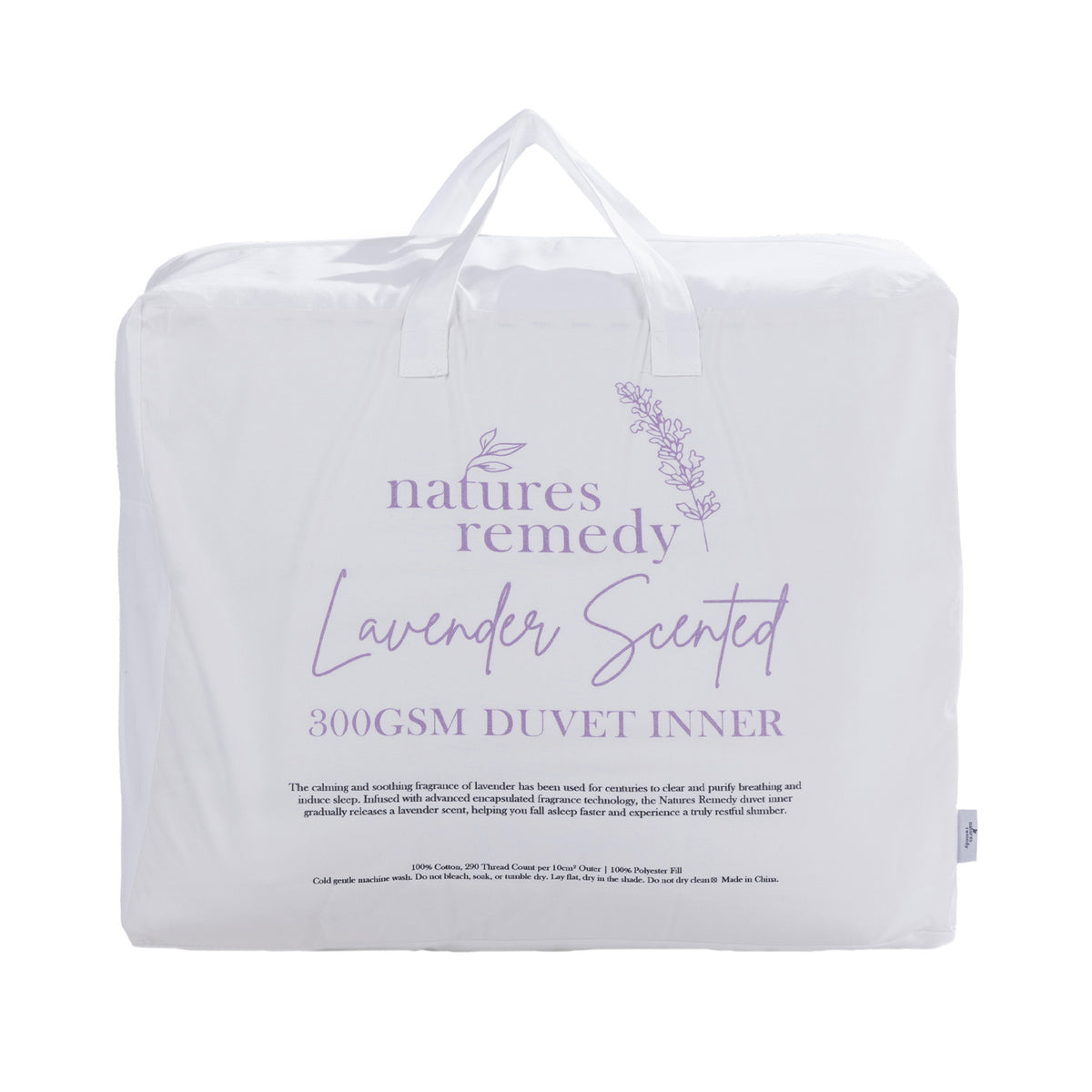 White carry bag containing the Nature's Remedy Lavender Scented 300gsm Duvet Inner, featuring lavender purple lettering, delicate floral illustrations and two white carry handles.