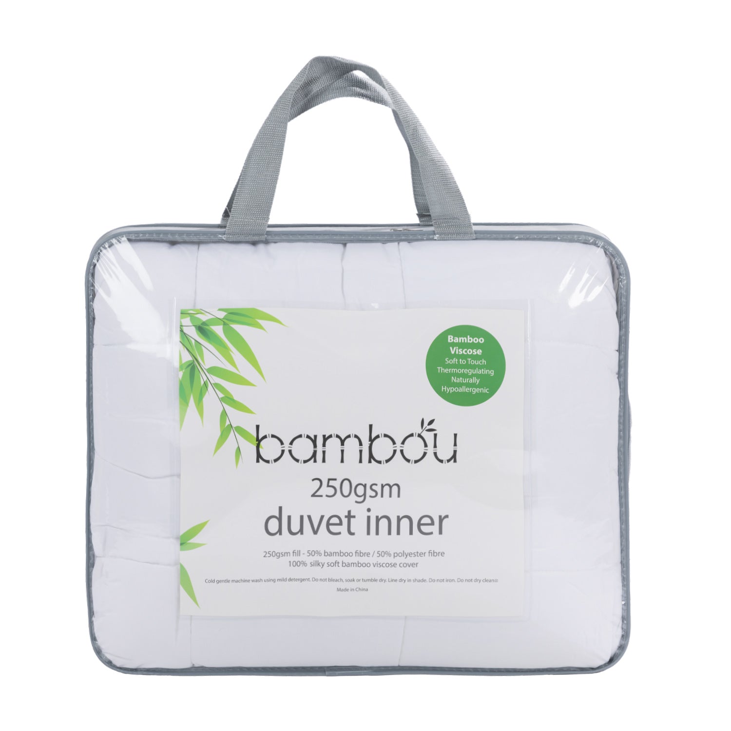 Bambou 250gsm Duvet Inner packaged in a clear carry bag with grey handles, showing the white quilted duvet and bamboo product label on the front.