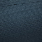 Close-up of the Design Plus August Cotton Waffle Duvet Cover Set in Diesel Blue, showcasing the textured waffle weave fabric and Diesel blue colour.