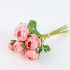 Bouquet of pink flowers with green leaves on a white background
