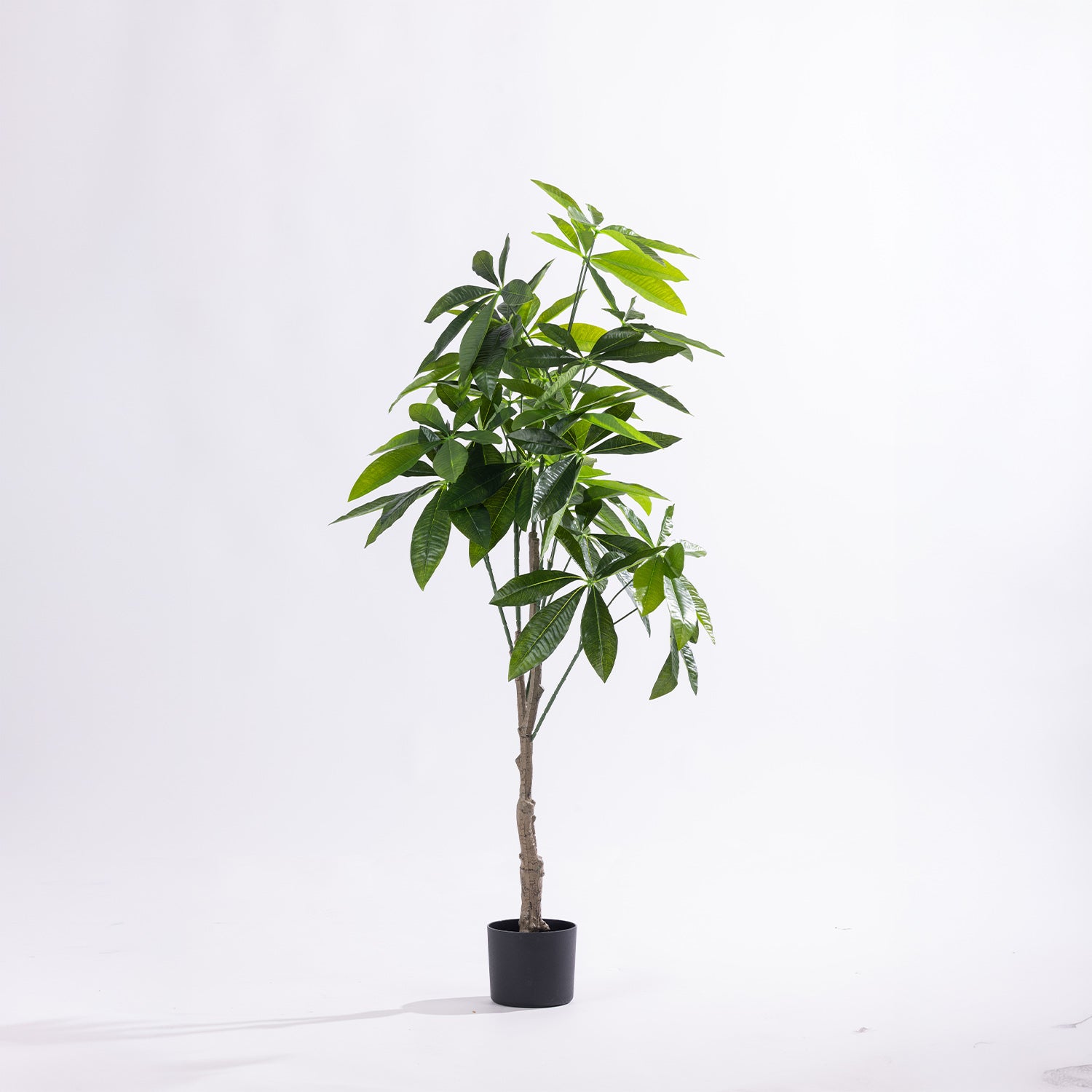 Artificial 125cm fortune tree with lush green foliage and a natural-look trunk displayed in a black nursery pot.